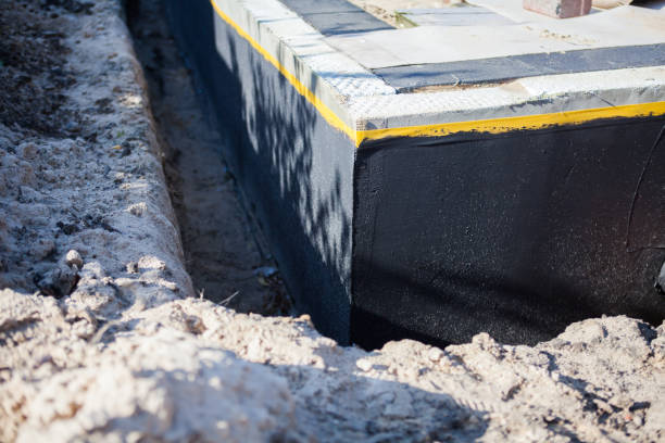 Professional Waterproofing technician working in Jessup, PA
